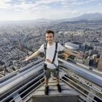 person standing on top of Taipei 101 tower in Taiwan City, Taiwan